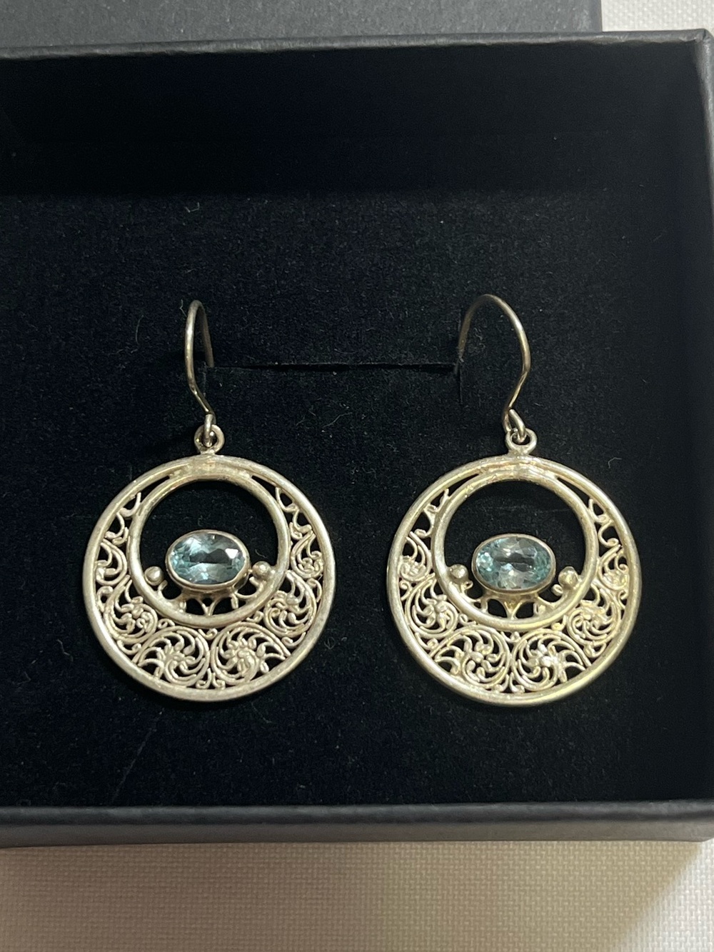 Sterling silver, blue topaz drop earrings
925